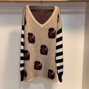 Striped V-Neck Sweater with Abstract Pattern